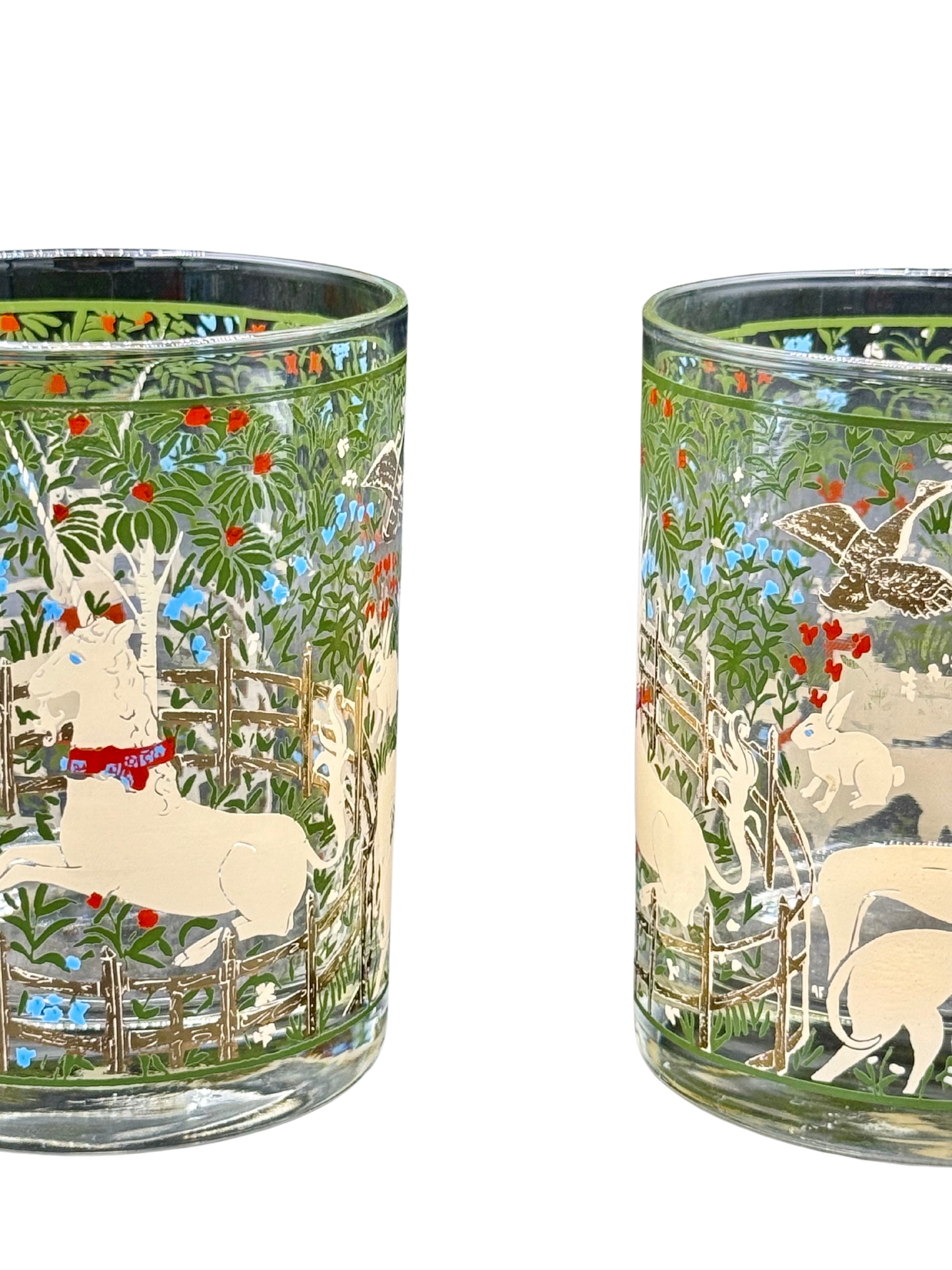 Pair of midcentury tumblers with unicorns, greyhounds, and foliage in gold and vivid color