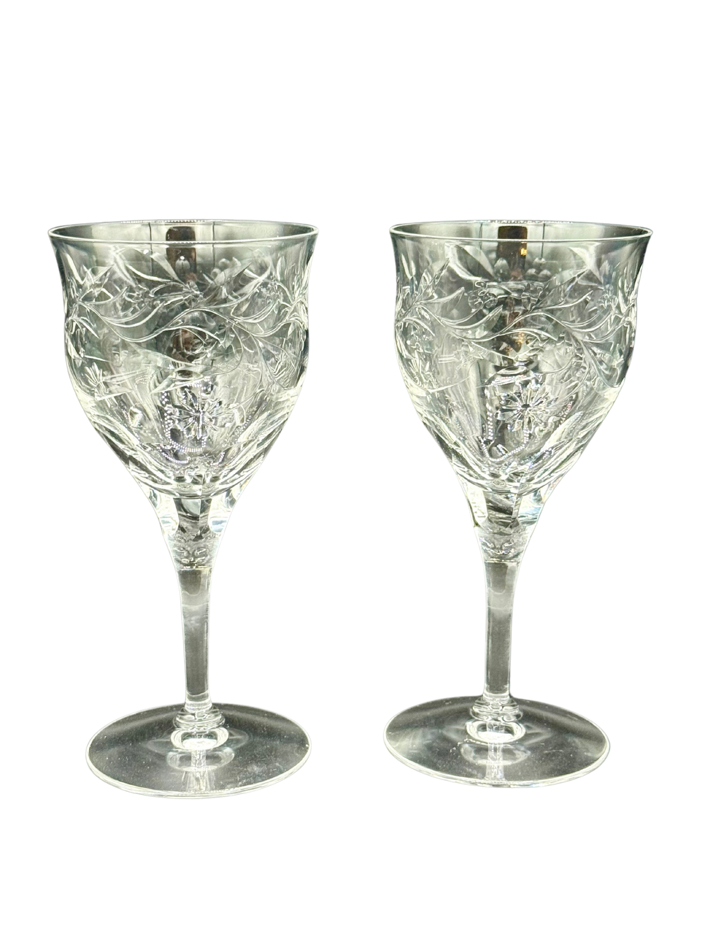Pair of vintage Seneca Crystal red wine glasses with intricate etched floral design and hand-cut detail, showcasing elegant midcentury lead crystal craftsmanship.