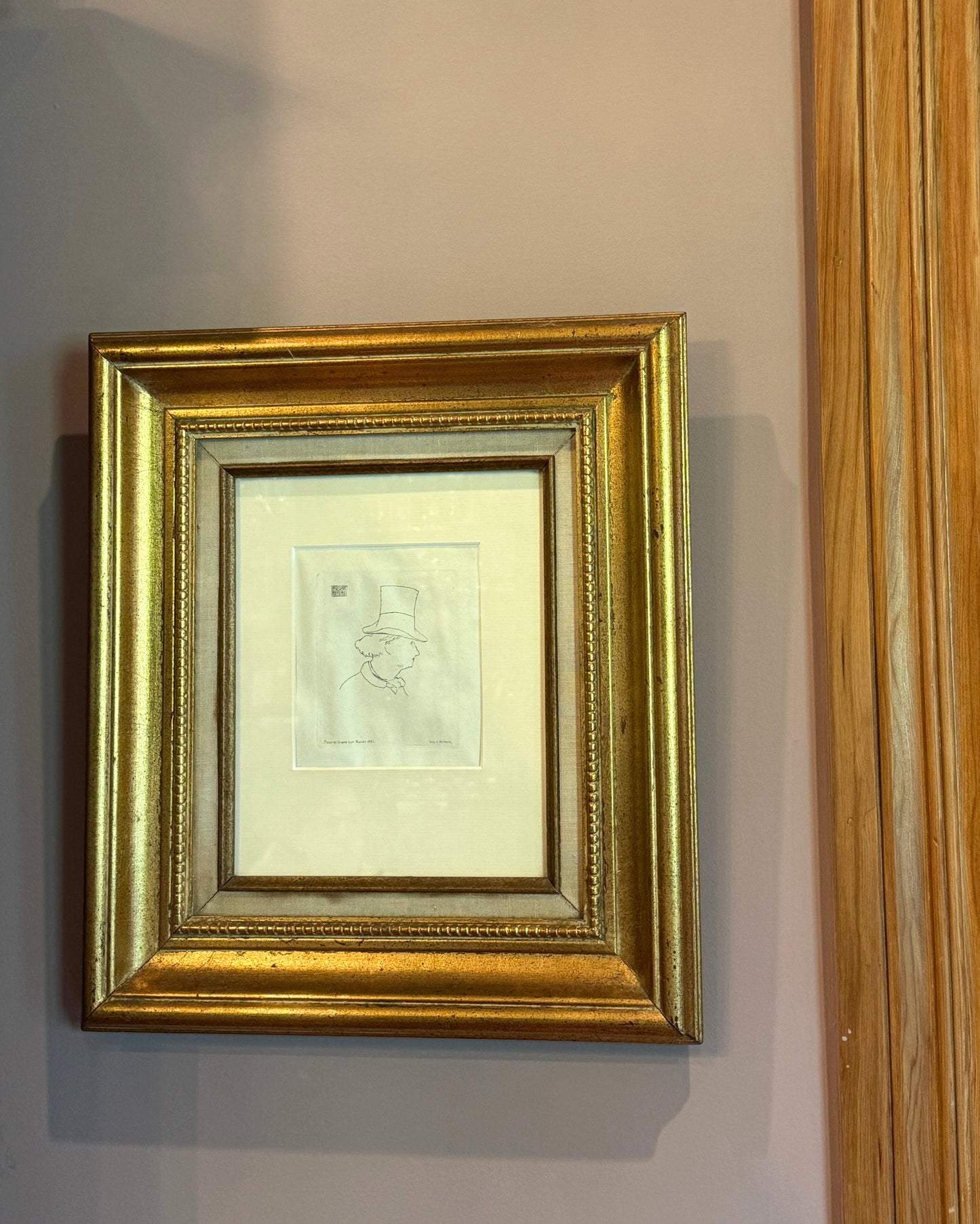 Front-facing view of Édouard Manet's 1862 etching of Baudelaire, in antique gold frame with linen matting, printed by Auguste Salmon.