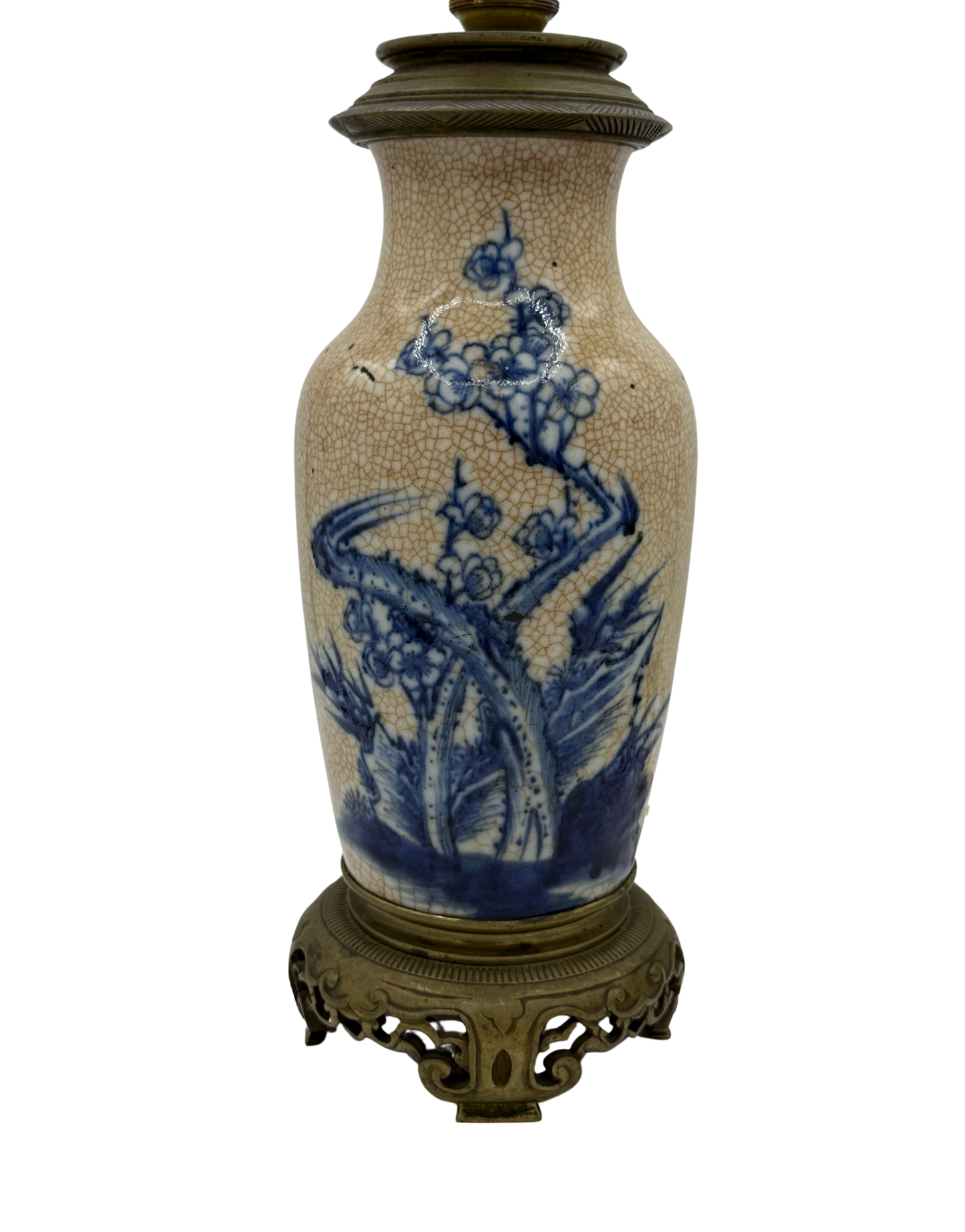 Antique French chinoiserie-style table lamp with blue underglaze floral painting, heavy crackle glaze, and ornate brass base.