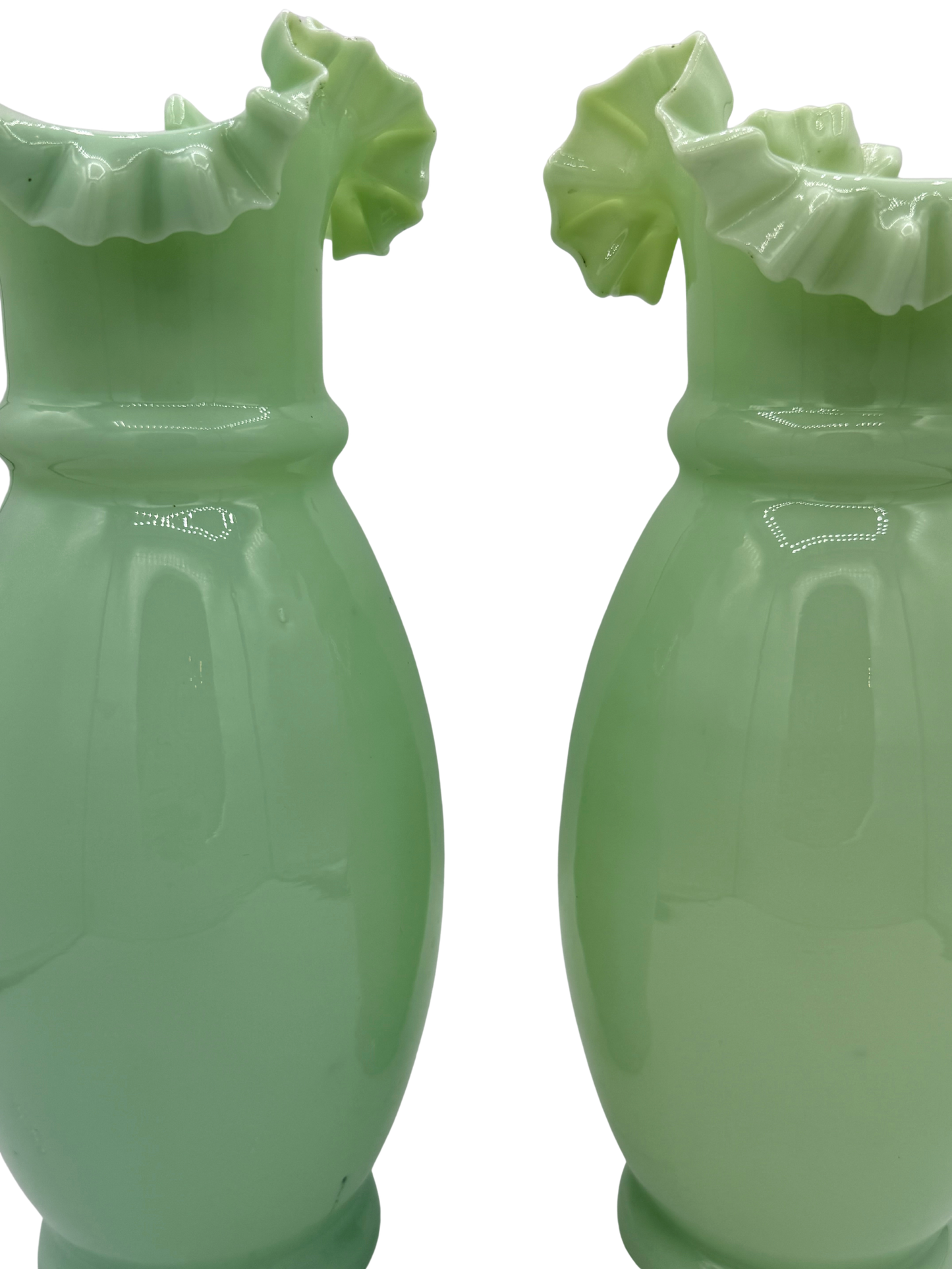 French hand-blown opaline glass vases, one upright and one lying down to display pontil scar on base, circa 1900–1920.