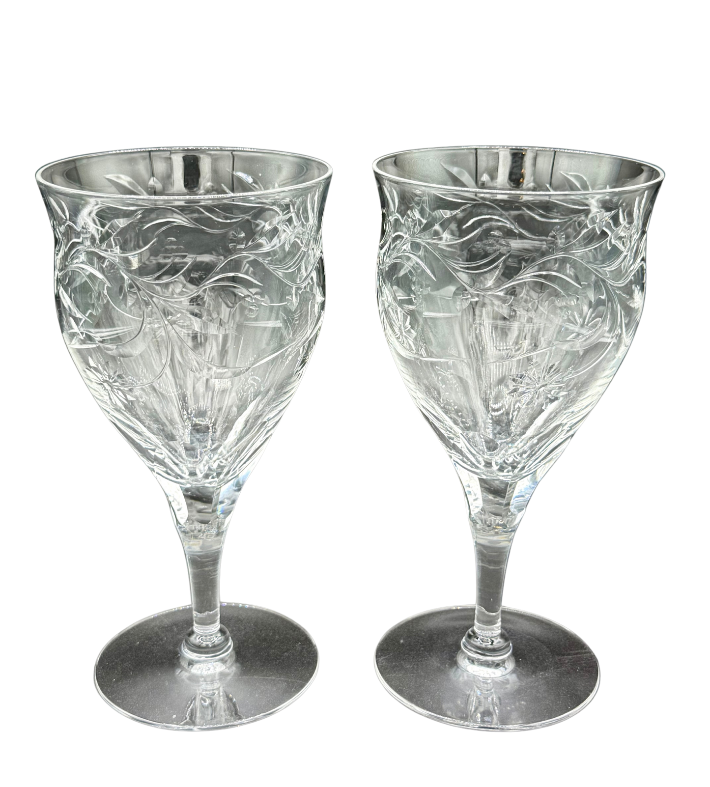 Pair of vintage Seneca Crystal water goblets with etched floral pattern and hand-cut lead crystal, measuring 6.75 inches tall.