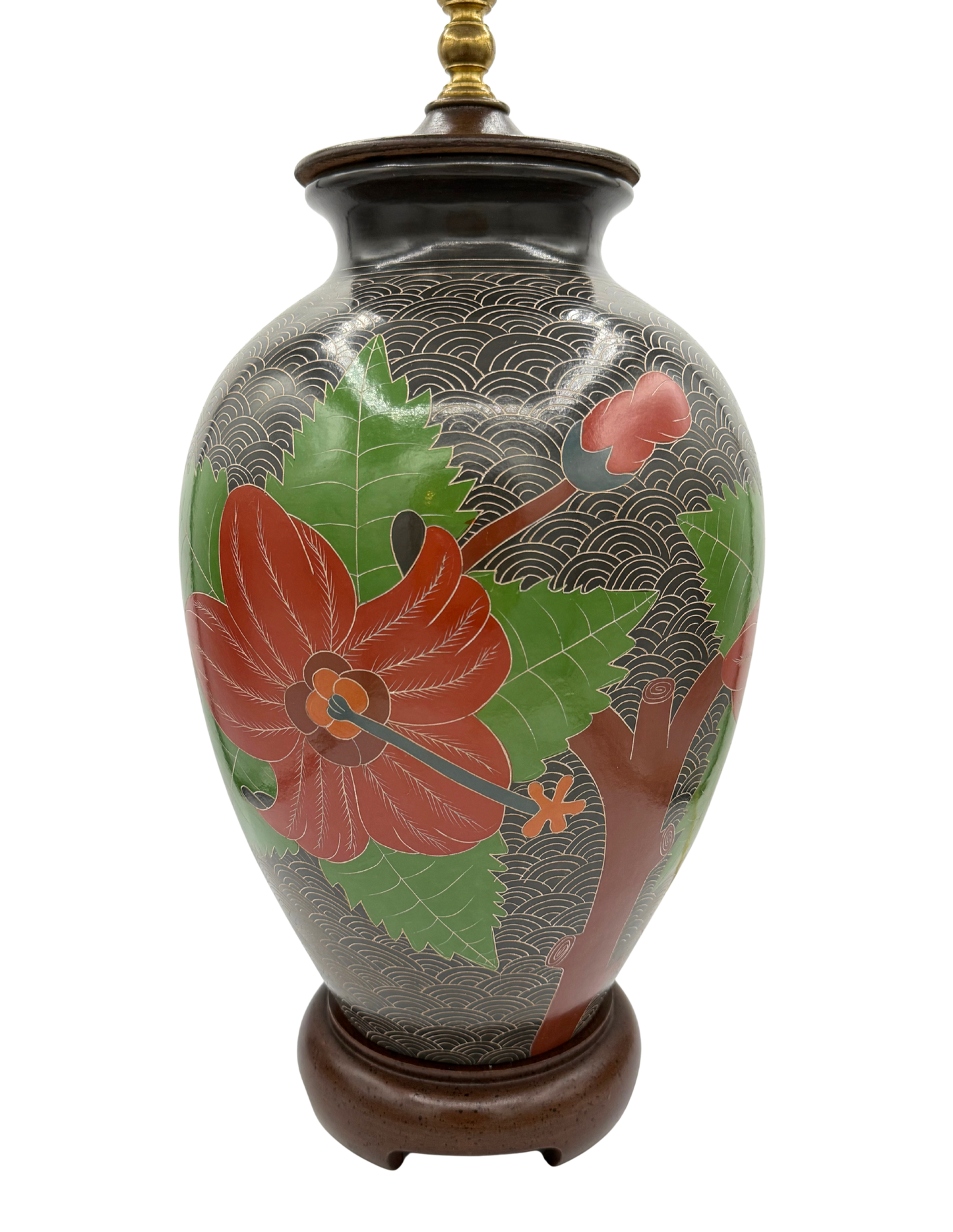 Full front view of vintage sgraffito ceramic lamp with carved floral design and brass light fitting on wood base