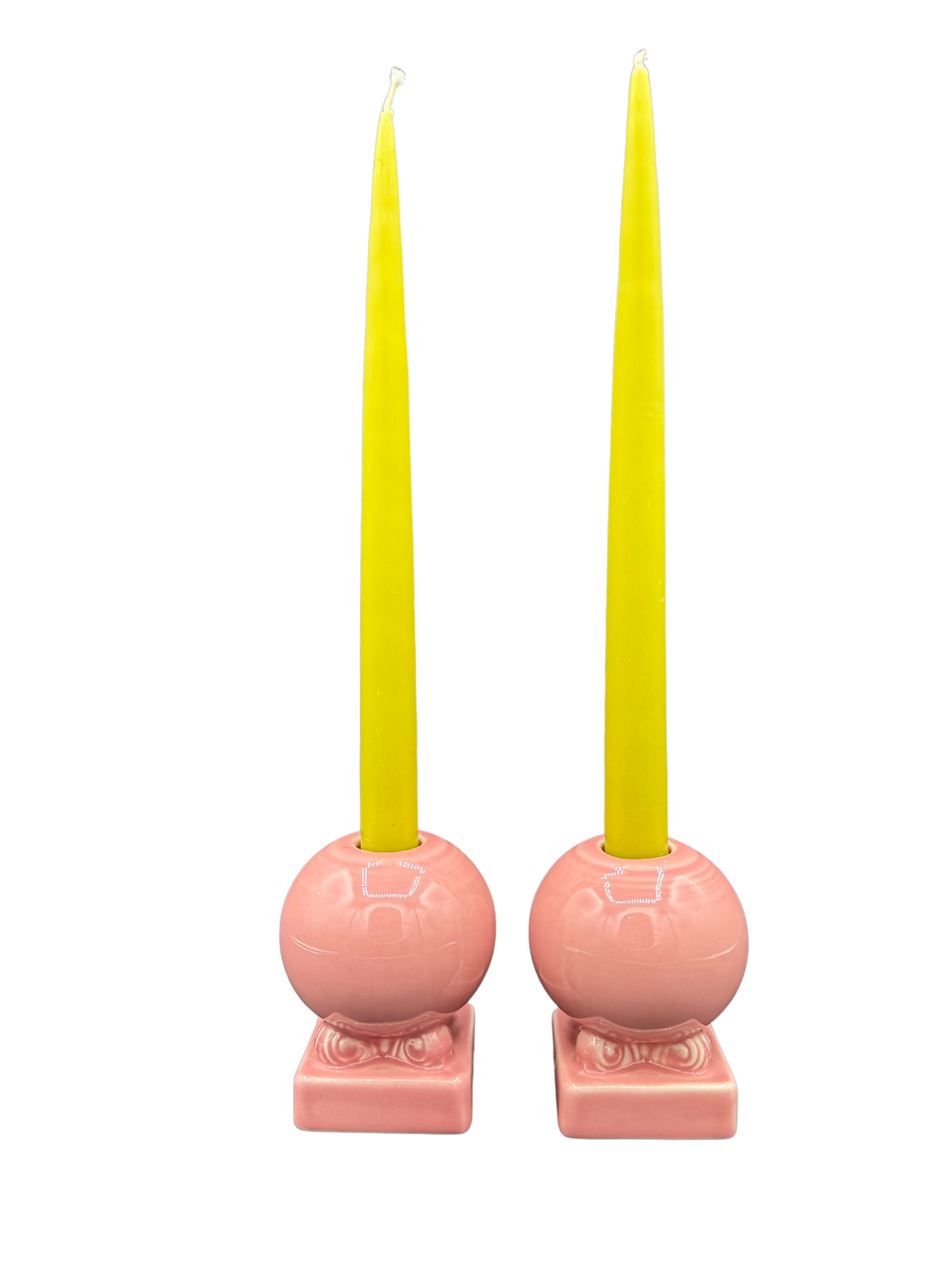 Pair of vintage Fiestaware pink candle holders with yellow tapers, midcentury ceramic home decor