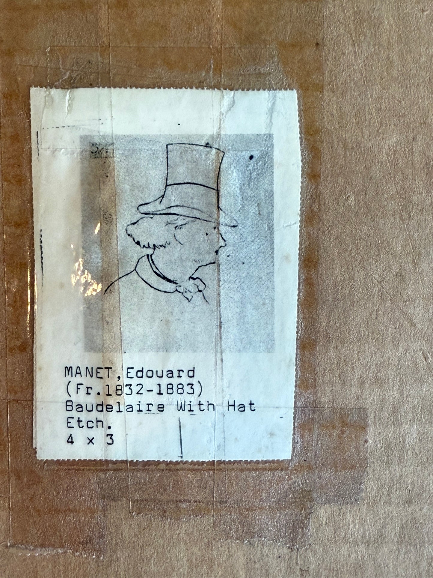 Typed label reading "MANET, Edouard (Fr. 1832–1883) Baudelaire With Hat Etch. 4 x 3," affixed to back of framed antique print.