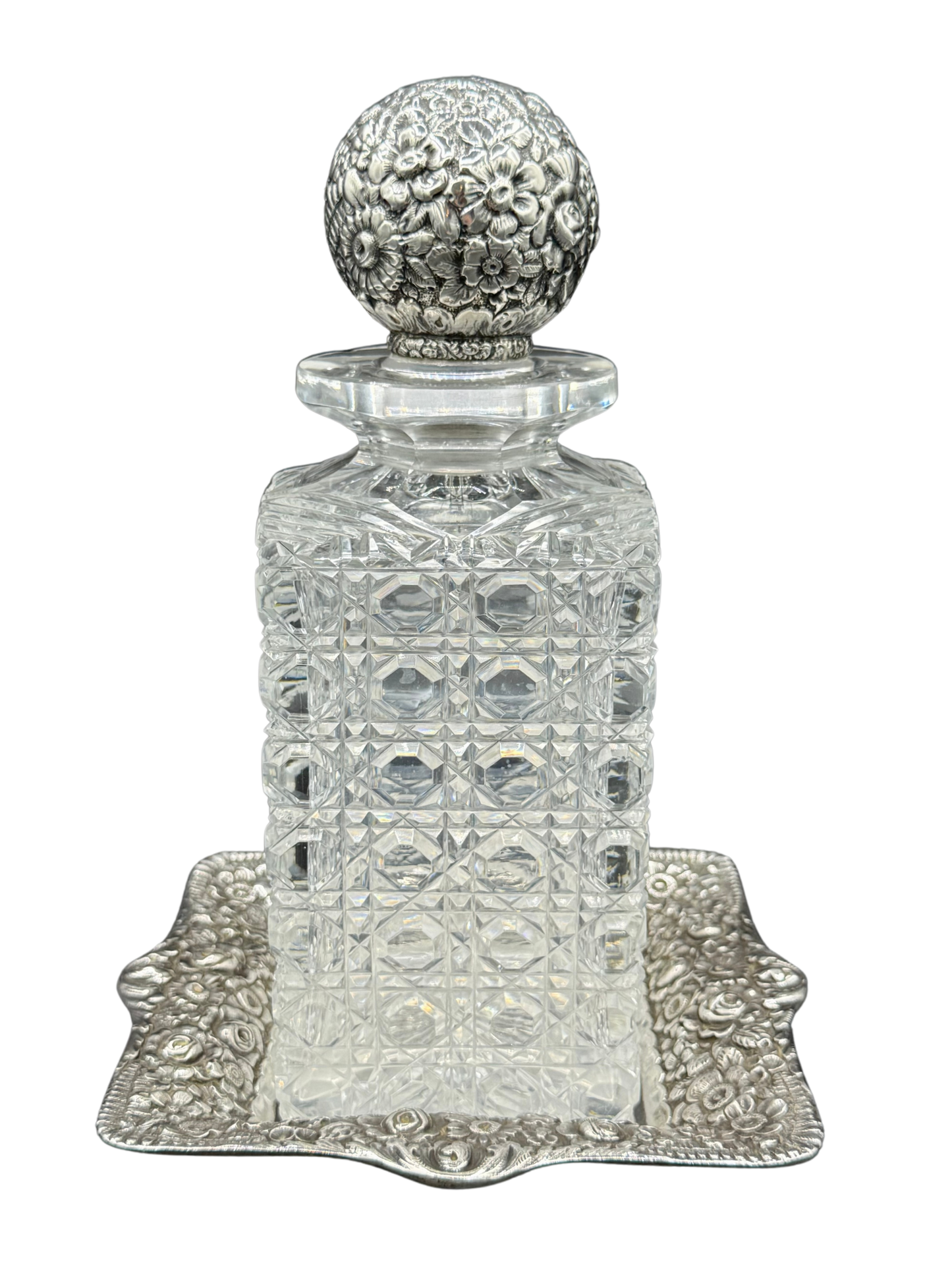 Antique Tiffany & Co. cut crystal decanter with sterling silver repoussé floral stopper and tray, circa 1870–1891