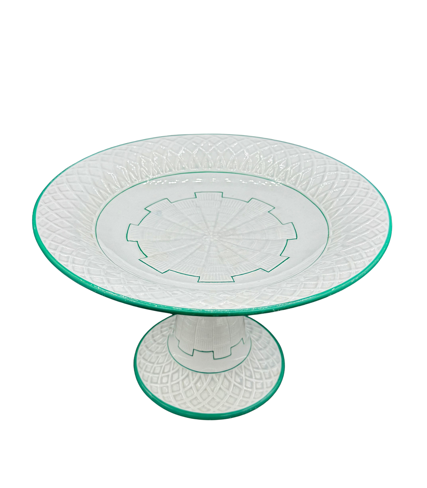 Antique Minton pedestal tazza with green enamel trim and basketweave relief, c. 1873, on black background