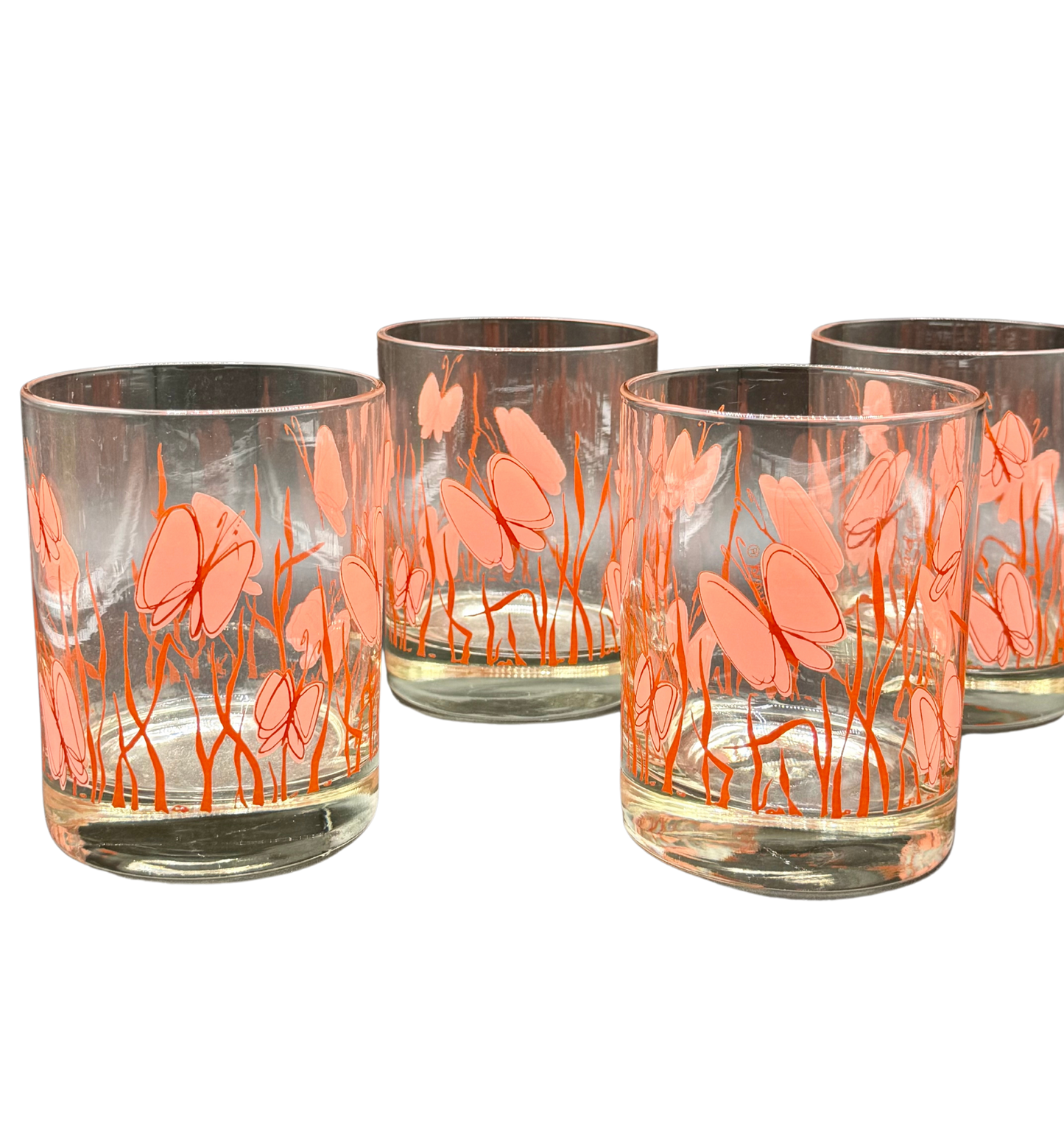 Set of four vintage butterfly glasses by Georges Briard in pink and orange midcentury pattern