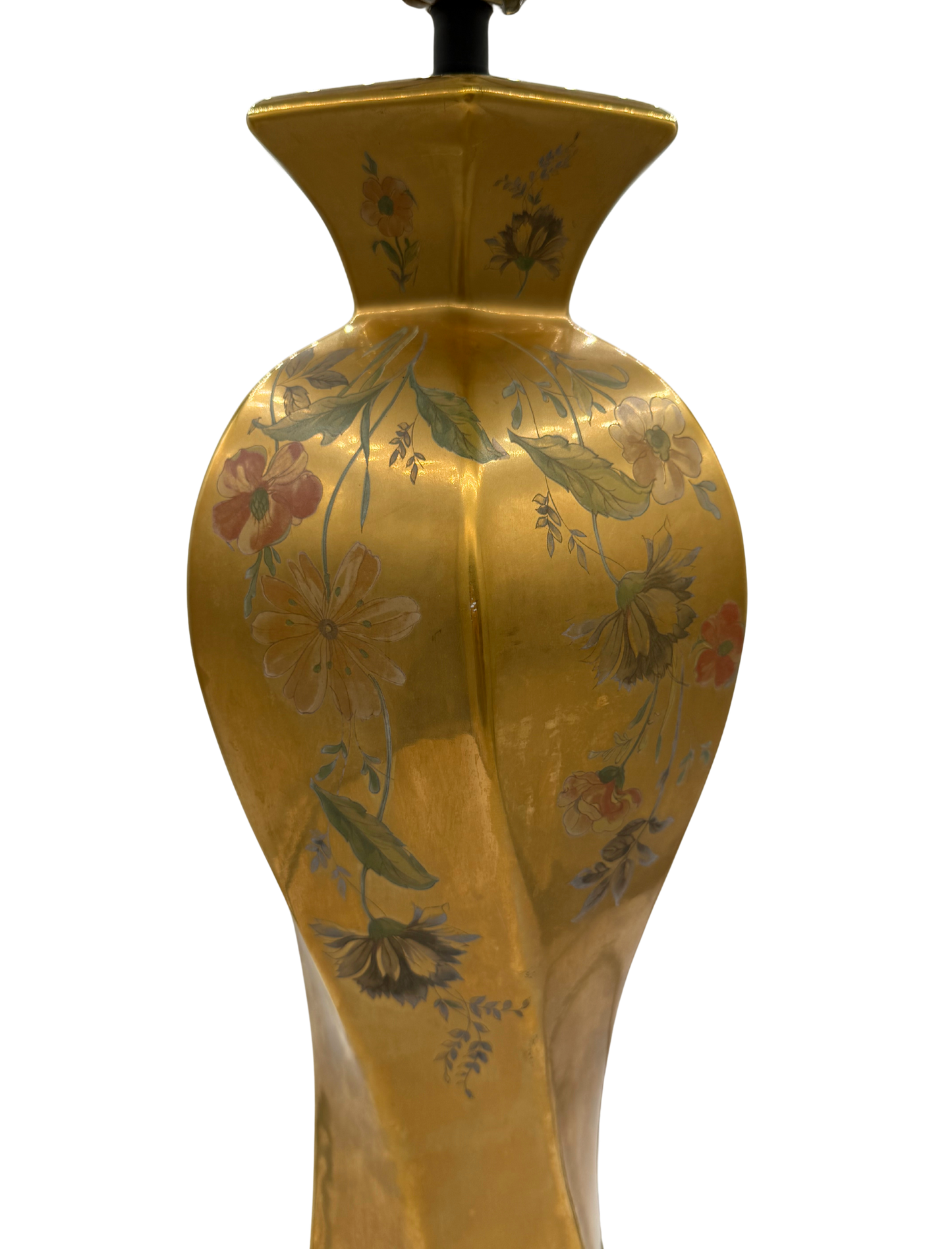Close-up of hand-painted floral motifs on gold porcelain Greenspan lamp with curved, sculptural form