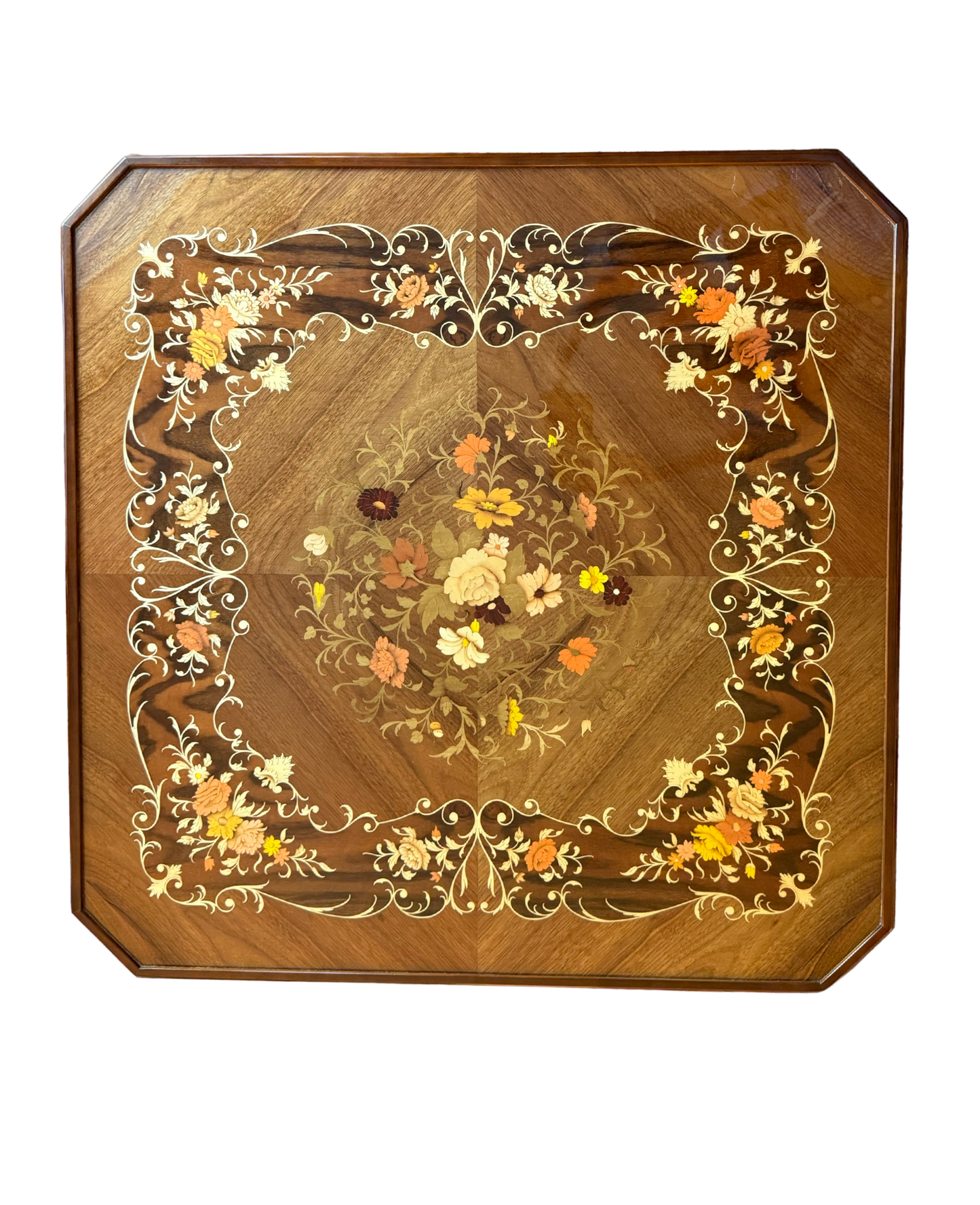 Close-up of floral marquetry detailing on 1970s game table