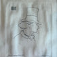 Close-up of 1862 Édouard Manet etching "Baudelaire With Hat," showing fine line work and age-related waviness in antique paper.