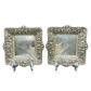 Pair of antique Tiffany & Co. repoussé sterling silver trays with floral borders and engraved monograms