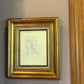 Front-facing view of Édouard Manet's 1862 etching of Baudelaire, in antique gold frame with linen matting, printed by Auguste Salmon.