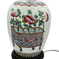 Early 20th-century Chinese Famille Rose ginger jar lamp with original lid, hand-painted pink peonies in a decorative basket, mounted on pagoda-style wooden base