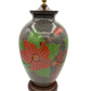 Vintage sgraffito stoneware table lamp with carved red flower and leaf motif, shown without lampshade on wood base