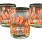 Group of Georges Briard glasses with butterfly motif and signature visible
