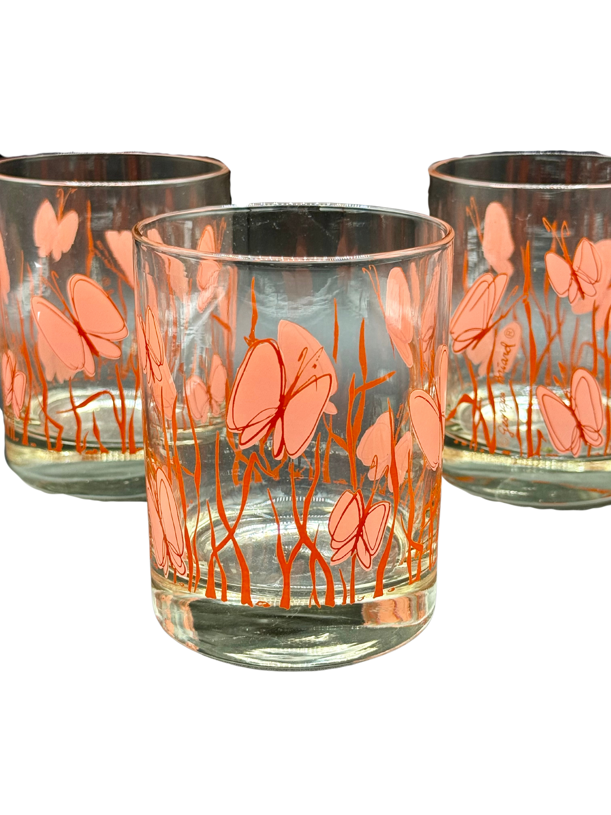 Group of Georges Briard glasses with butterfly motif and signature visible