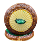 Top view of Victorian ceramic cheese dome lid with sunburst glaze and green finial