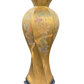 Vintage Morris Greenspan Hollywood Regency lamp with gold porcelain body, floral detailing, and sculptural twisted silhouette