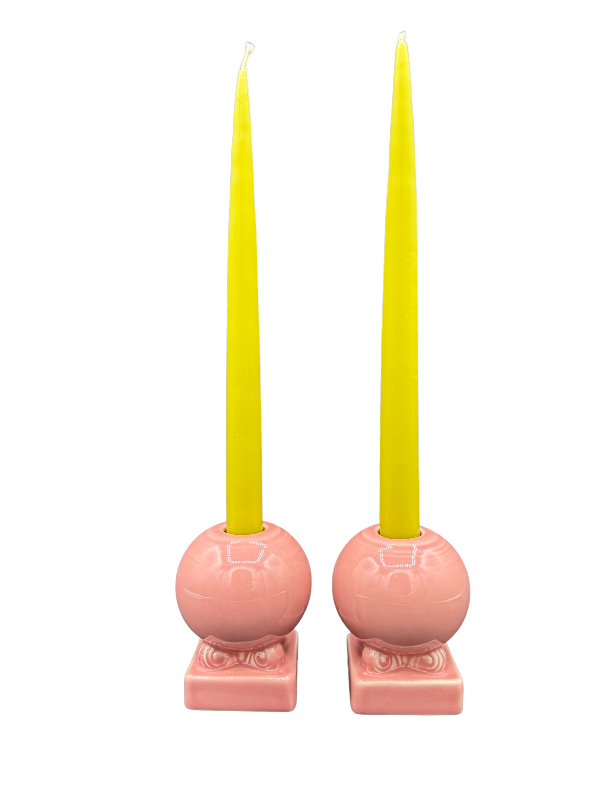 Pair of vintage Fiestaware pink candle holders with yellow tapers, midcentury ceramic home decor
