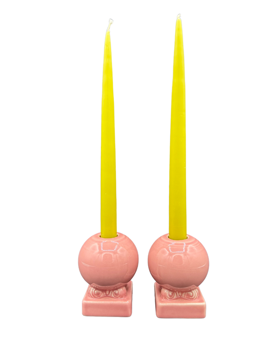 Pair of vintage Fiestaware pink candle holders with yellow tapers, midcentury ceramic home decor