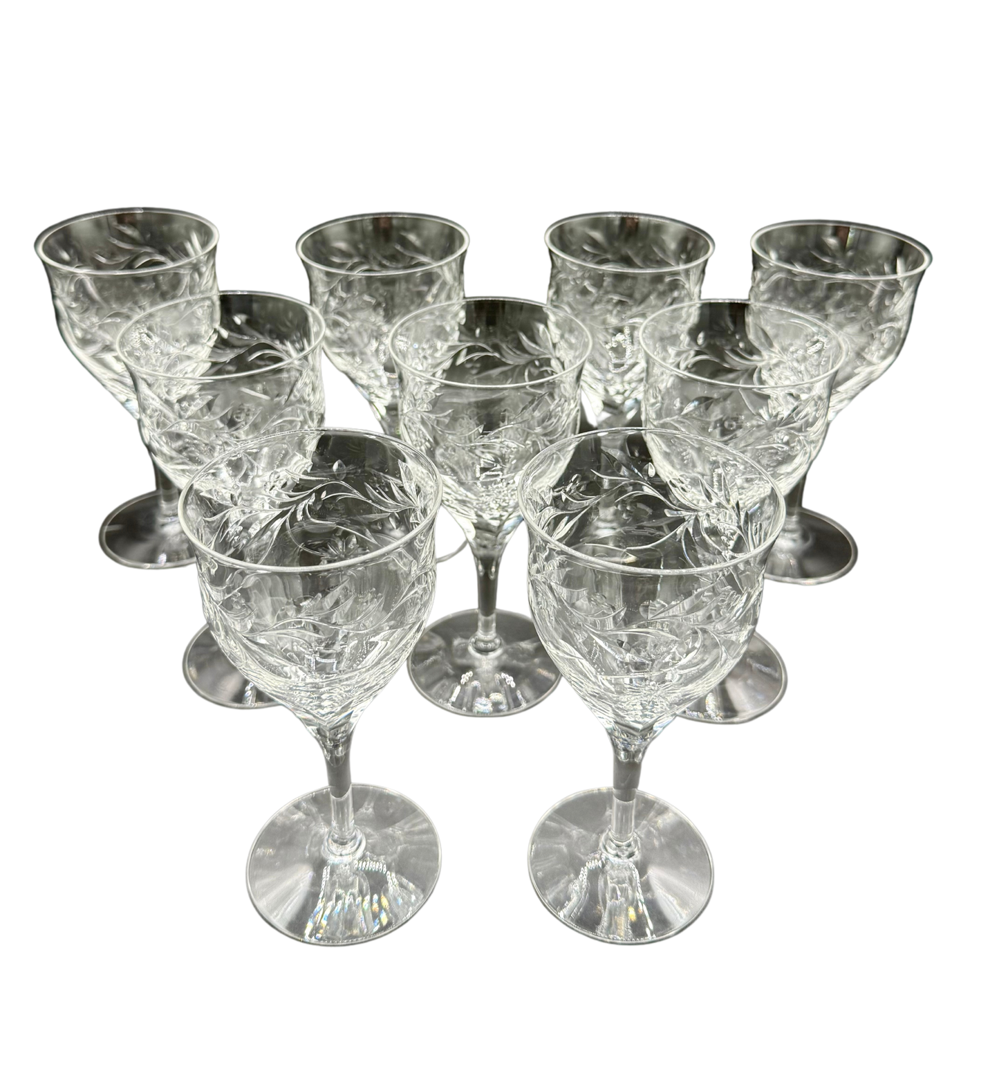 Complete set of nine vintage Seneca Crystal red wine glasses with floral etching, radiant clarity, and hand-cut design, perfect for entertaining or display