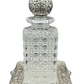Antique Tiffany & Co. cut crystal decanter with sterling silver repoussé floral stopper and tray, circa 1870–1891