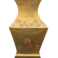 Front view of vintage Morris Greenspan lamp with gold porcelain body, hand-painted floral motifs, and black wooden base