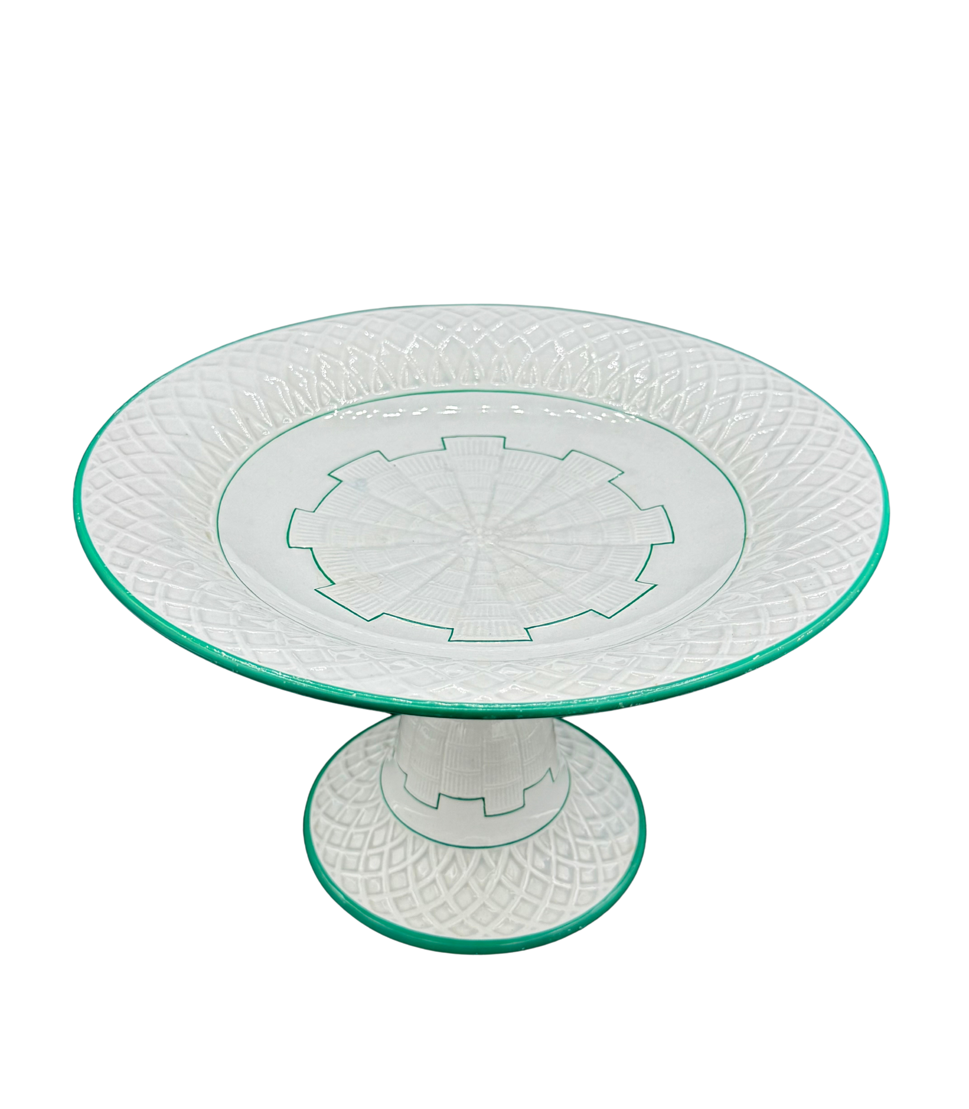 Antique Minton pedestal tazza with green enamel trim and basketweave relief, c. 1873, on black background