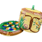 Lid removed from 19th-century majolica cheese dome revealing vibrant hand-painted majolica base