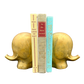 Vintage brass elephant bookends with mid-century modern books, Luigi Colani style